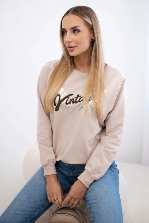 Beige sweatshirt with print