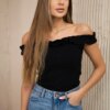 Black blouse with ruffles over the shoulder