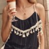 Black boho blouse with tassels on hangers