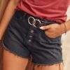 Black denim shorts with buttons