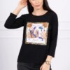 Blouse with 3D graphics and decorative pom pom black