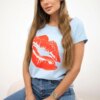 Blue blouse with lip print