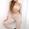 Complete with a beige blouse top