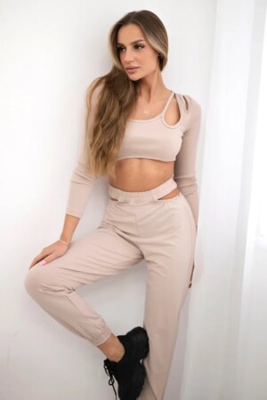 Complete with a beige blouse top