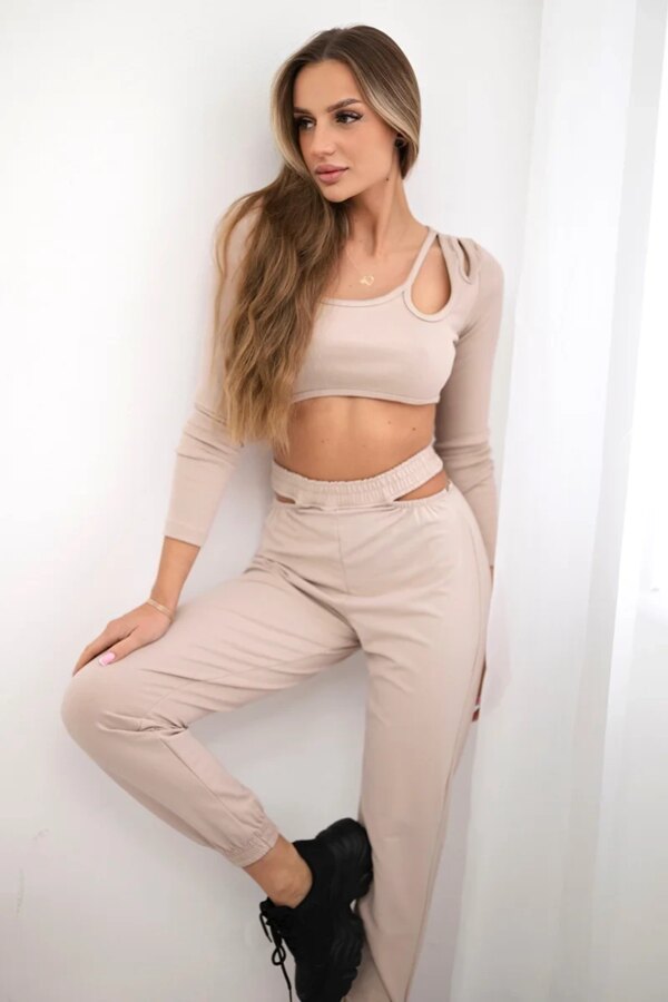 Complete with a beige blouse top