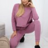 Complete with an oversized blouse in dark pink