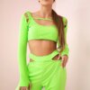 Complete with green neon blouse top