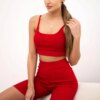 Complete with red high-waisted trousers