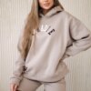 Cotton set with embroidered Paradise inscription dark beige