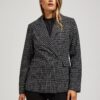Double-breasted blazer with decorative buttons