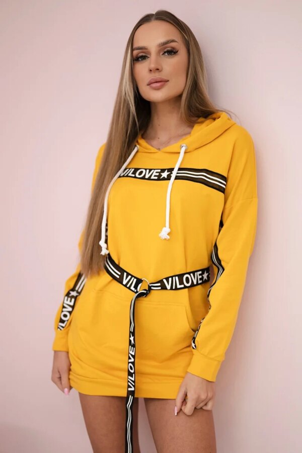 Dress decorated with a mustard inscription tape