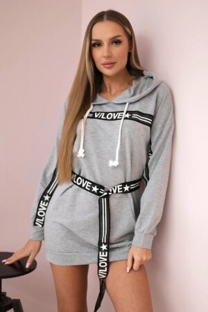 Dress decorated with a tape with gray inscriptions Dress decorated with a tape with gray inscriptions