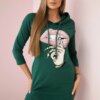 Dress with a longer back and a colorful print in dark green