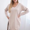 Dress with pockets and beige V-neckline