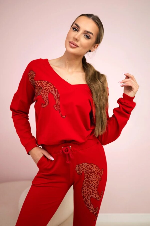 Fitted with panther red zircon