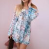 Floral dress on the shoulders of azure color