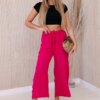 Fuchsia-coloured wide-waisted trousers