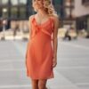 Glamorous dress with coral lashes