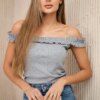 Grey blouse with ruffles above the shoulders