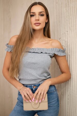 Grey blouse with ruffles above the shoulders
