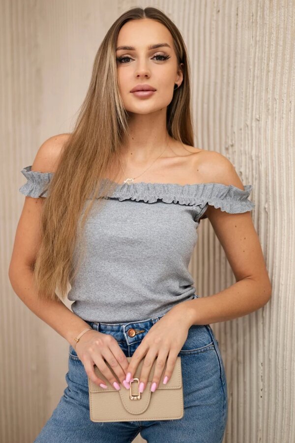 Grey blouse with ruffles above the shoulders