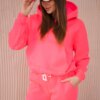 Insulated set with a sweatshirt with a tie at the bottom of the pink neon color