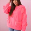 Insulated sweatshirt with pink neon decorative bows