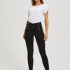 Jeans with decorative buttons