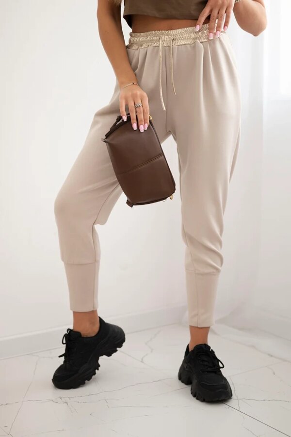 Kesi Włoski Butter-soft pants with a golden waistband cuff beige