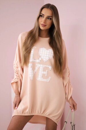 Kesi Włoski Dress with a longer back and print apricot