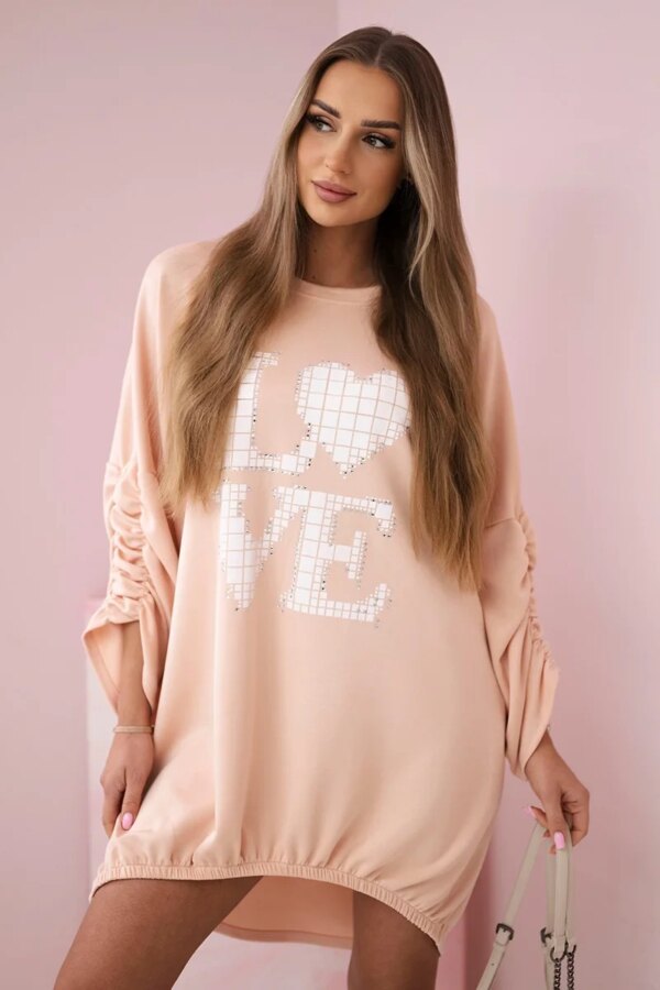 Kesi Włoski Dress with a longer back and print apricot