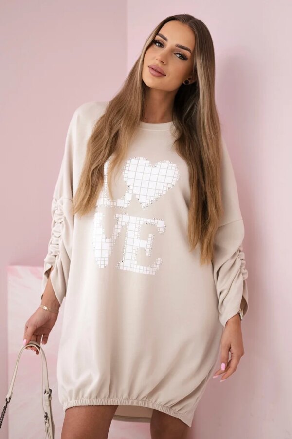 Kesi Włoski Dress with a longer back and print beige