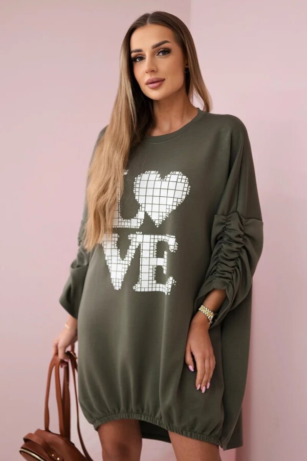 Kesi Włoski Dress with a longer back and print khaki