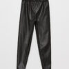 LC Waikiki Girls' Leather-Look Pants with Elastic Waist.