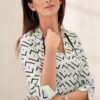 Lady's blouse with pistachio pattern
