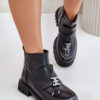 Leather ankle boots on a flat heel with a black insulated black Asperra decoration