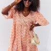 Loose dress with puff sleeves in light orange