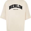 Merchcode Póló 'Berlin'  fekete / gyapjúfehér-Ár