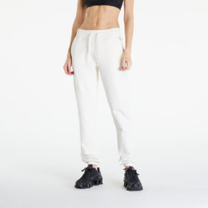 Nadrágok The North Face Zumu Joggers White Dune S-alacsony-ár