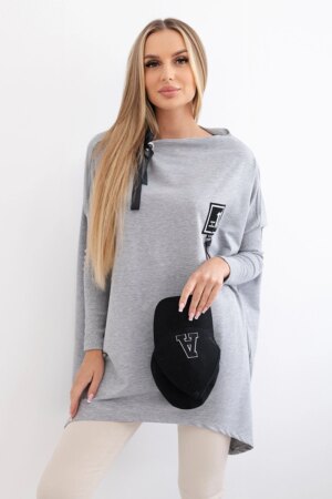 Oversize sweatshirt with asymmetrical sides in gray color