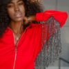 Oversize women's red sweatshirt with fringe