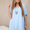Oversized blouse with blue pendant