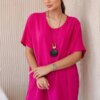 Oversized blouse with fuchsia-colored pendant