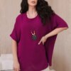 Oversized blouse with plum pendant