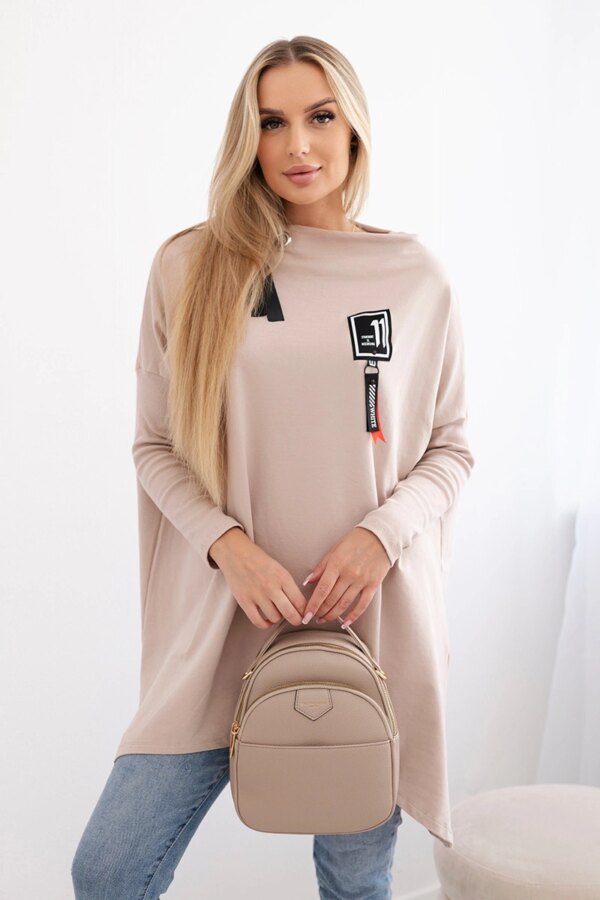 Oversized sweatshirt with asymmetrical sides in beige color