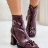 Patent leather ankle boots with heel lined with D&A burgundy decoration