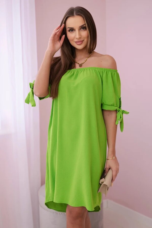Pistachio dress with ties on the sleeves