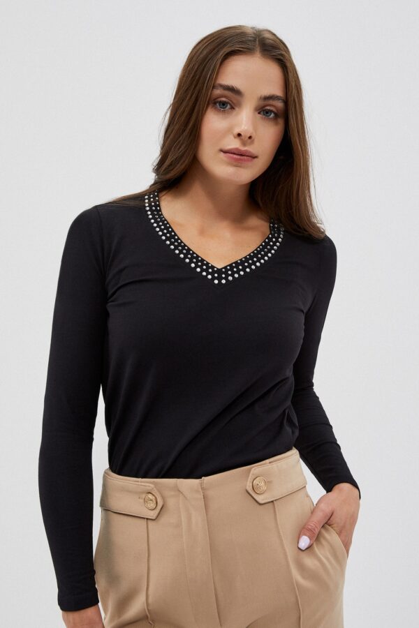 Plain blouse with a decorative neckline