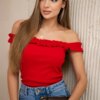Red blouse with ruffles over the shoulder