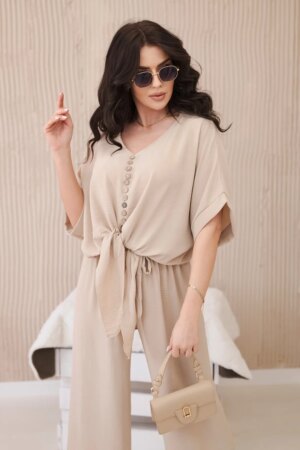 Set of blouse with trousers in beige color
